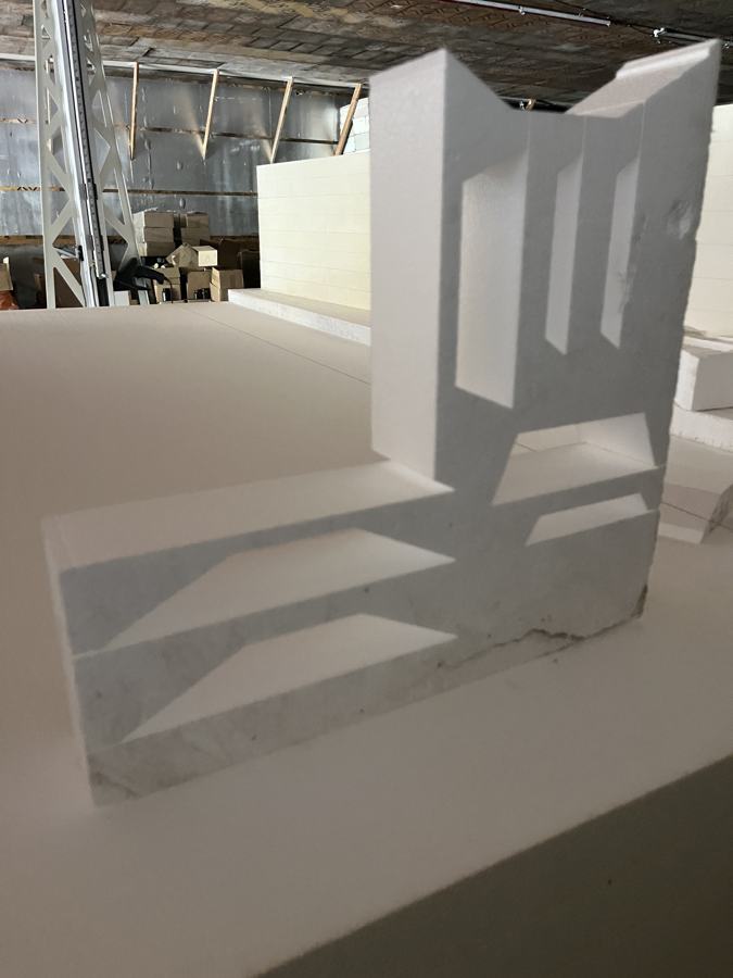 Custom hot-wire cut white EPS foam shape in the shop