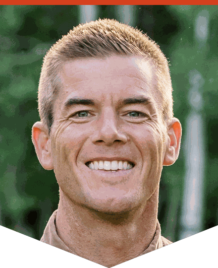 Isaac Rodebush, owner of Rapid Insulation, smiling in a tan shirt